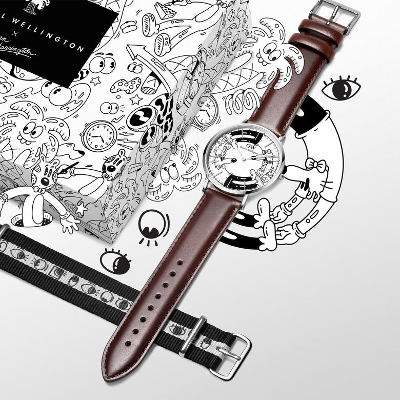 Steven Harrington x Daniel Wellington Bristol BW dial & Strap Silver set displayed with a brown leather strap, creative illustrated dial, and an interchangeable black and white NATO strap featuring an eye-print motif, alongside exclusive packaging with playful artwork.