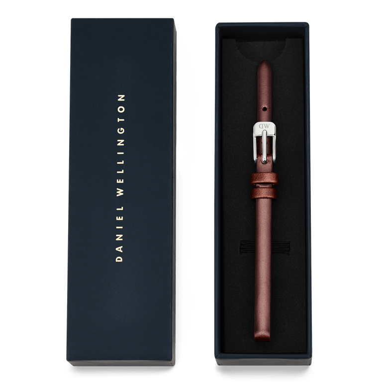 Pressed St Mawes Strap Silver presented in a navy Daniel Wellington gift box, featuring a slim brown genuine leather strap with a polished silver pin buckle.