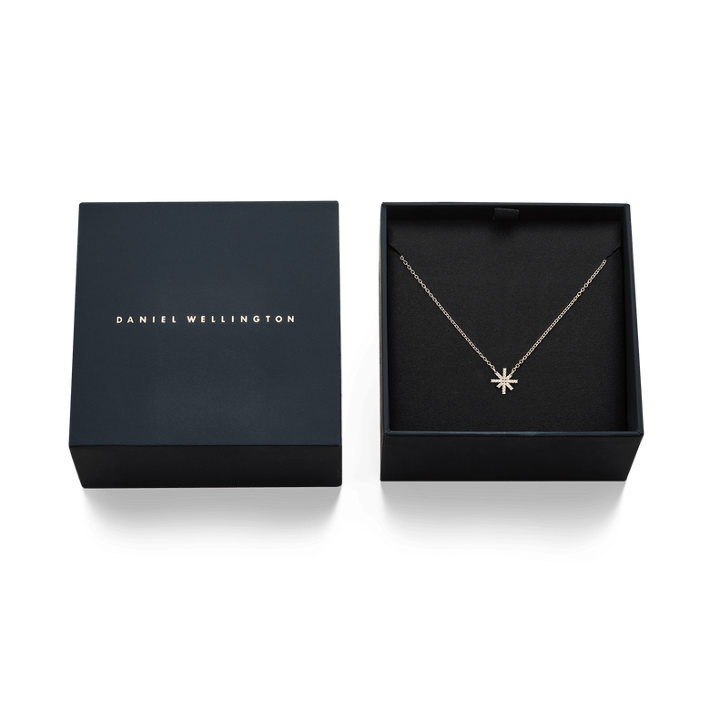 Mirelle Star Necklace Rose Gold displayed in an elegant Daniel Wellington gift box, featuring a fine rose gold chain and sparkling star pendant, ideal for gifting or adding a refined touch to your jewellery collection.