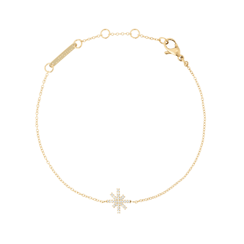 Delicate gold bracelet featuring a star-shaped charm set with white cubic zirconia stones on a fine adjustable chain, designed for a subtle and elegant look.