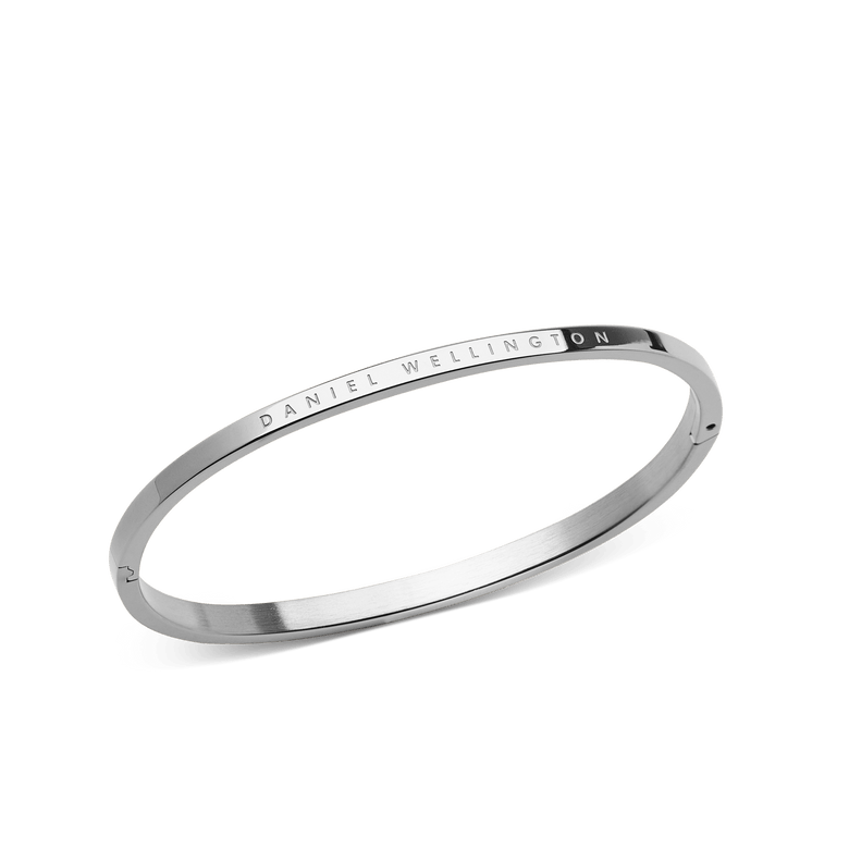 Classic Bangle Silver with a polished stainless steel finish, featuring a slim minimalist design and the Daniel Wellington logo engraved along the edge.