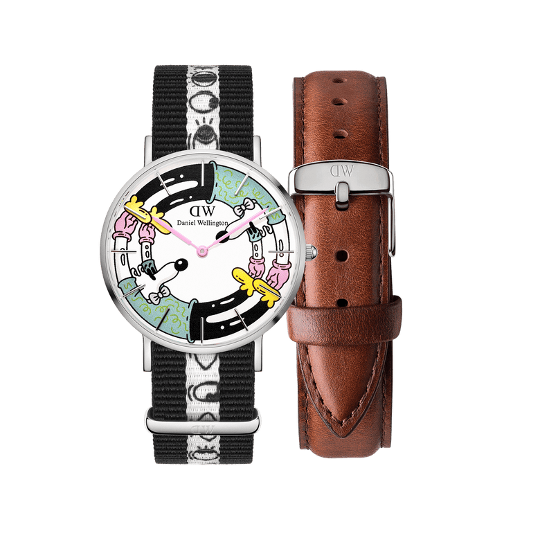Limited edition Steven Harrington x Daniel Wellington watch set featuring a multicolour printed dial with playful illustrations, a black and white NATO strap, and an additional brown St Mawes leather strap.