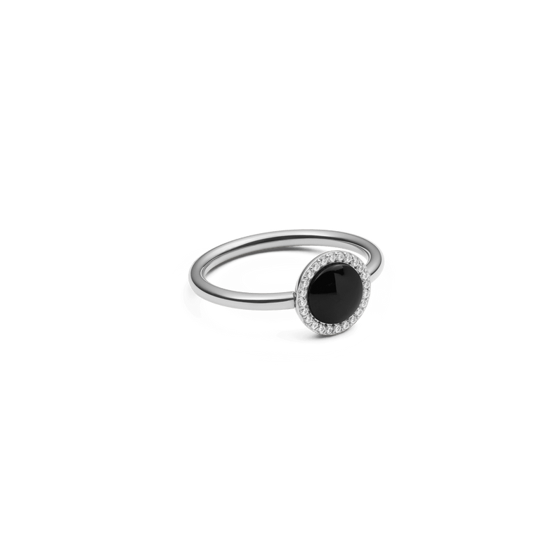 Elegant silver ring featuring a domed black agate centrepiece surrounded by a halo of white cubic zirconia, showcasing a modern and sophisticated design.