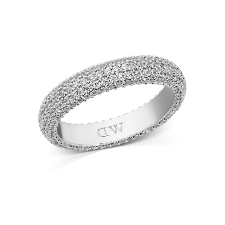 A wide silver pavé ring with a 5 mm band, fully set with multiple rows of sparkling white crystals for a bold, elegant look. The inside of the ring is polished, highlighting its quality craftsmanship and comfortable fit.