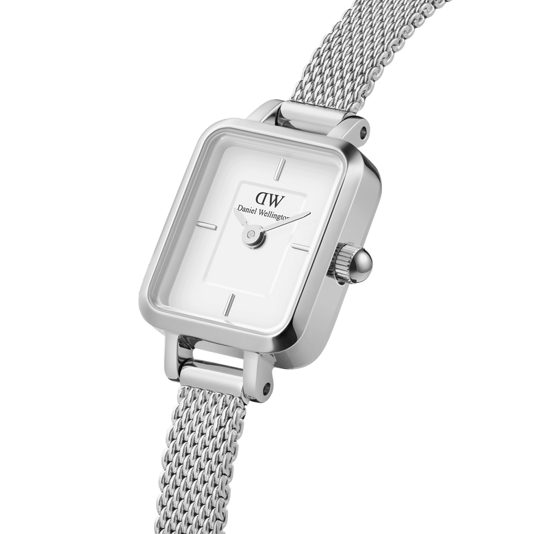 Close-up of the Quadro Mini Sterling silver ladies watch, showcasing its rectangular stainless steel case, minimalist white dial, and polished silver mesh strap.