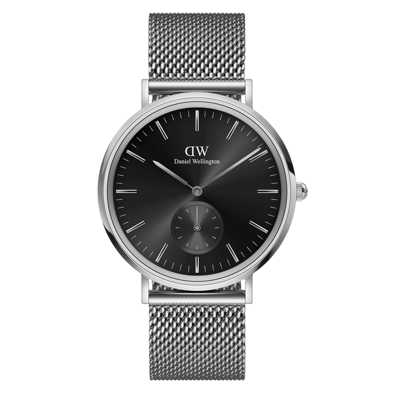 Classic Multi-Eye Sterling Onyx men's watch with a 40mm black dial, minimalist face, silver mesh strap, and seconds subdial, featuring a polished stainless steel case and adjustable band.
