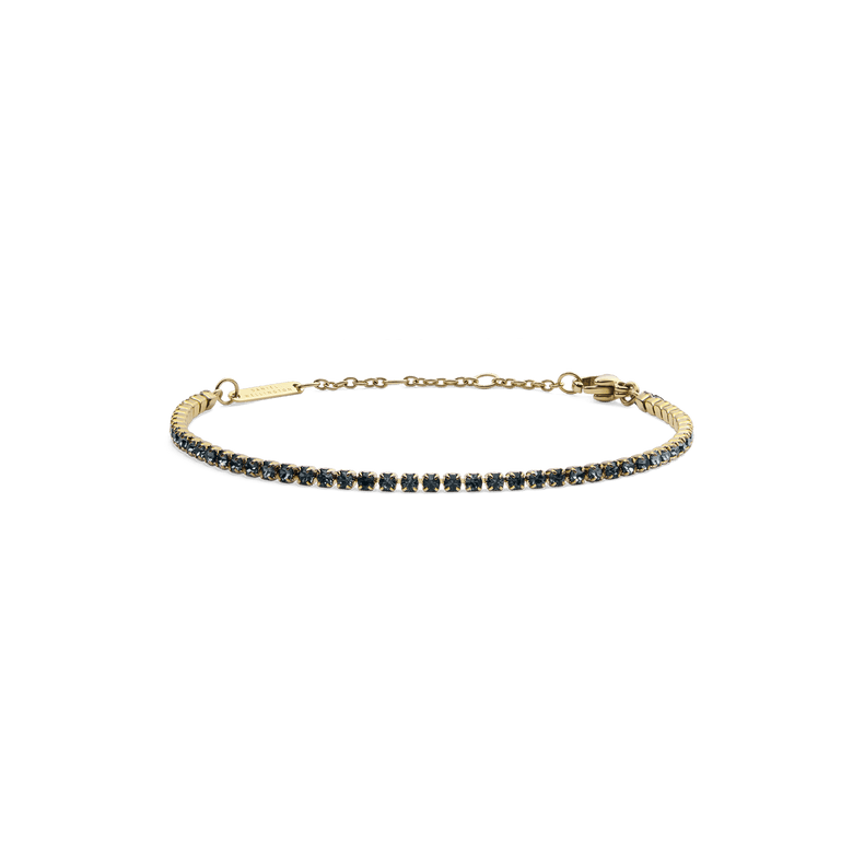 Classic Tennis Bracelet Nightfall Gold featuring a slim gold band set with deep-coloured Preciosa crystals, adjustable chain and lobster clasp, designed for a refined and elegant look.