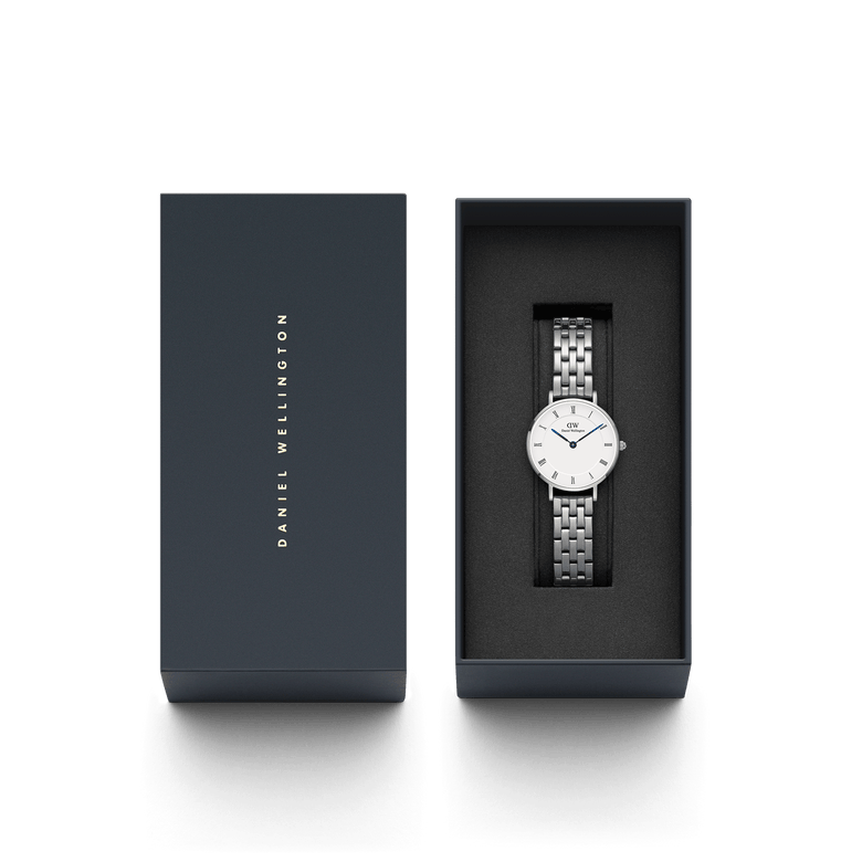 Petite Roman Numerals 5-Link Silver watch presented in a sleek Daniel Wellington gift box, featuring a white dial with Roman numerals, blue steel hands, and a polished five-link stainless steel bracelet.