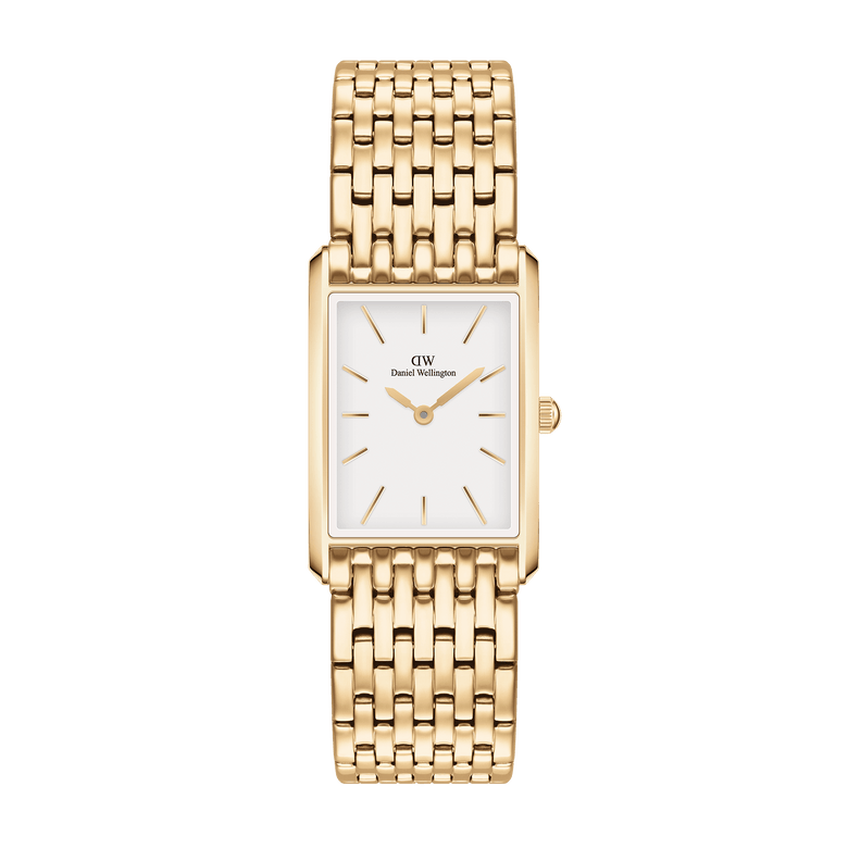 Bound 9-Link Gold watch for women featuring a slim rectangular 18k gold plated case, crisp white dial with minimalist gold markers, and an integrated 9-link gold bracelet.