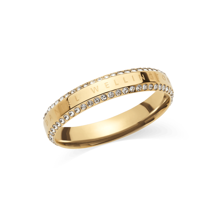 Classic Aura Duo Ring Gold featuring a polished gold band with engraved detail, framed by two rows of sparkling pavé-set crystals for a refined and modern look.