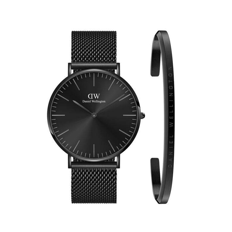 Classic Mesh Onyx watch with a round black dial and a black mesh steel strap, paired with a slim black Classic Bracelet featuring subtle branding, both showcasing a minimalist and elegant design.