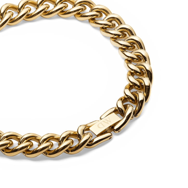 Detail view of the Chunky Chain Bracelet Gold, highlighting the thick polished gold links and the sturdy fold-over clasp for a secure fit.