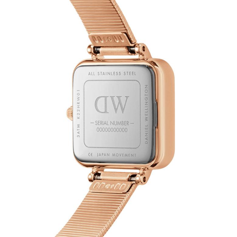 Quadro Studio Rose Gold watch case back displaying stainless steel construction, Japanese movement details, and a rose gold piano link strap, highlighting its durability and premium craftsmanship.
