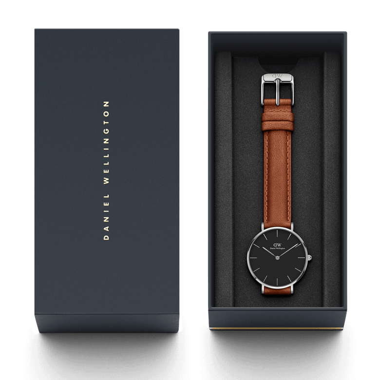 Petite Durham Black Silver ladies watch presented in a Daniel Wellington gift box, featuring a sleek black dial, polished silver case, and light brown leather strap.