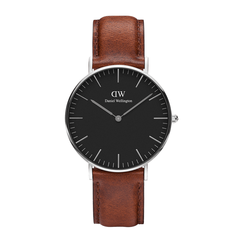 Classic St Mawes Black Silver watch featuring a slim polished silver case, minimalist black dial with silver markers, and a genuine brown leather strap.
