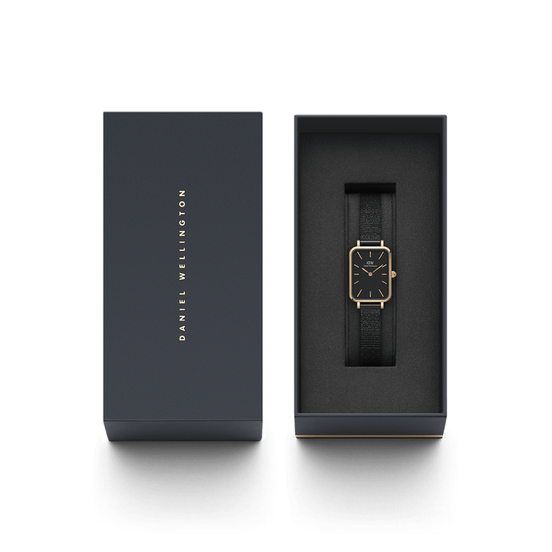 Quadro Pressed Ashfield rose gold ladies watch with a black mesh strap, presented in a sleek Daniel Wellington gift box, ideal for gifting or special occasions.