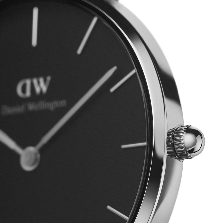 Detail view of the Petite Bondi Black Silver watch highlighting the polished silver case, minimalist black dial, and silver crown for a sleek, modern finish.