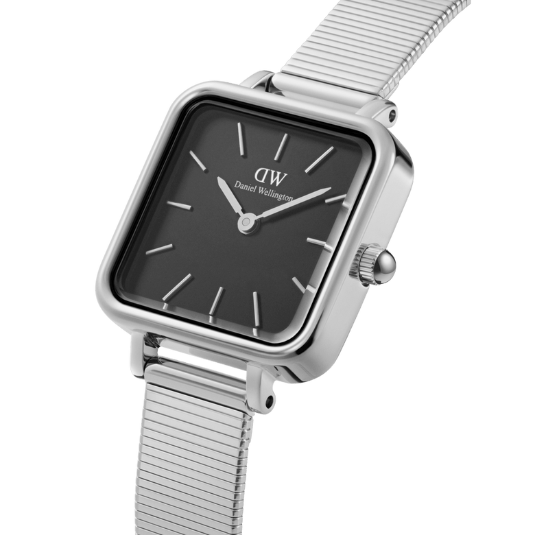 Quadro Studio Silver features a square black dial and polished silver piano link strap, highlighting its minimalist design and adjustable fit for petite wrists.