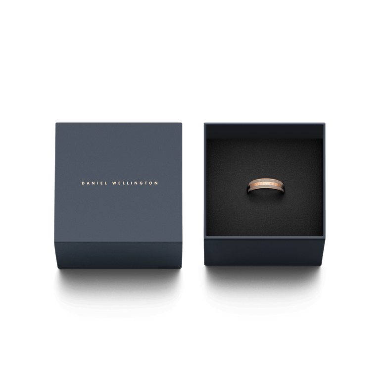 Emalie Ring Desert Sand Rose Gold displayed in an elegant Daniel Wellington gift box, highlighting the rose gold band with desert sand enamel and engraved logo, ideal for gifting or adding to a jewellery collection.