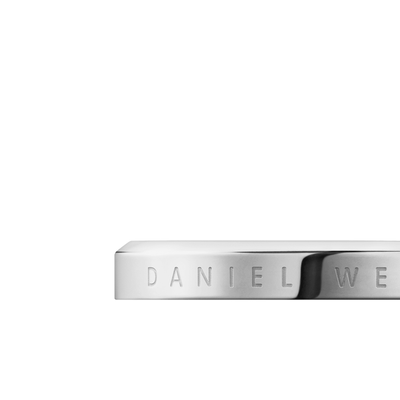 Close-up of the Classic Ring in silver stainless steel, showing the engraved Daniel Wellington branding and smooth, polished finish.
