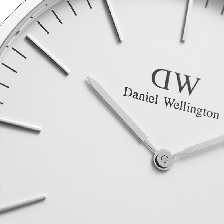 Close-up of the Classic Roselyn Silver watch face, showing the eggshell white dial, slim silver hour markers, and minimalist silver hands for a refined, modern look.
