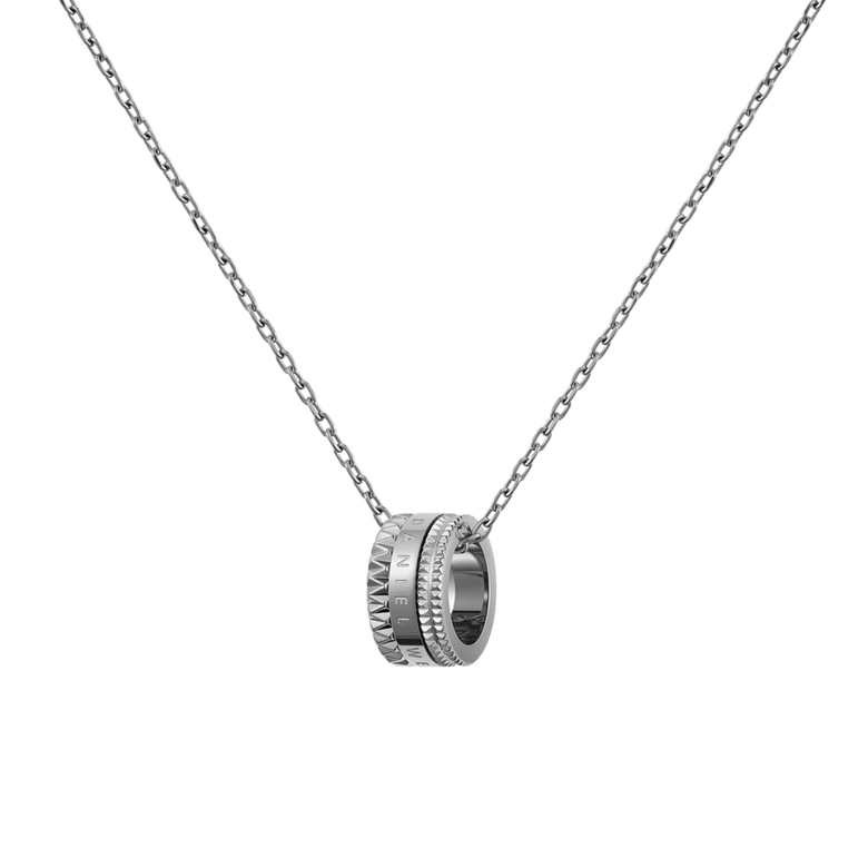 Silver necklace with a geometric ring pendant featuring intricate detailing and a polished finish, suspended on a fine adjustable chain. The modern, sculptural design of the Elevation Necklace Silver adds a distinctive touch to everyday or occasion wear.