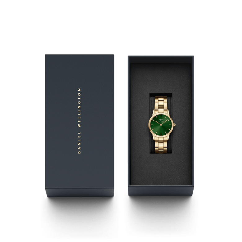 Iconic Link Emerald Gold watch with a gold-plated stainless steel bracelet and emerald green dial, elegantly presented in a black Daniel Wellington gift box.