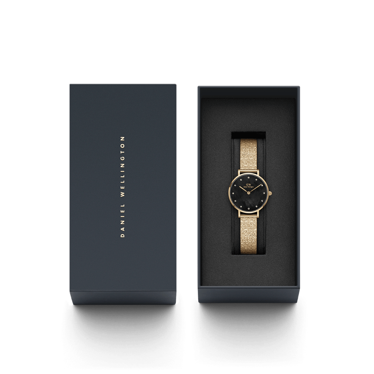 Petite Lumine Pressed Piano Black MoP Gold watch presented in a sleek Daniel Wellington gift box, featuring a gold mesh strap and a black mother of pearl dial with crystal markers.