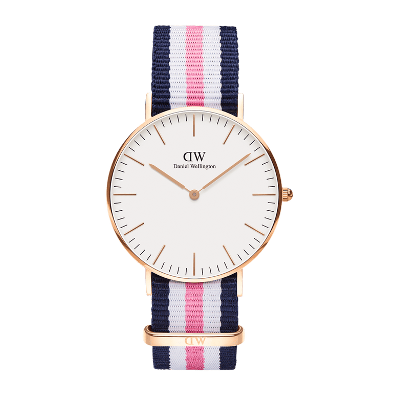 Classic Southampton ladies watch with a rose gold case, minimalist white dial, and a navy, pink, and white striped NATO fabric strap.