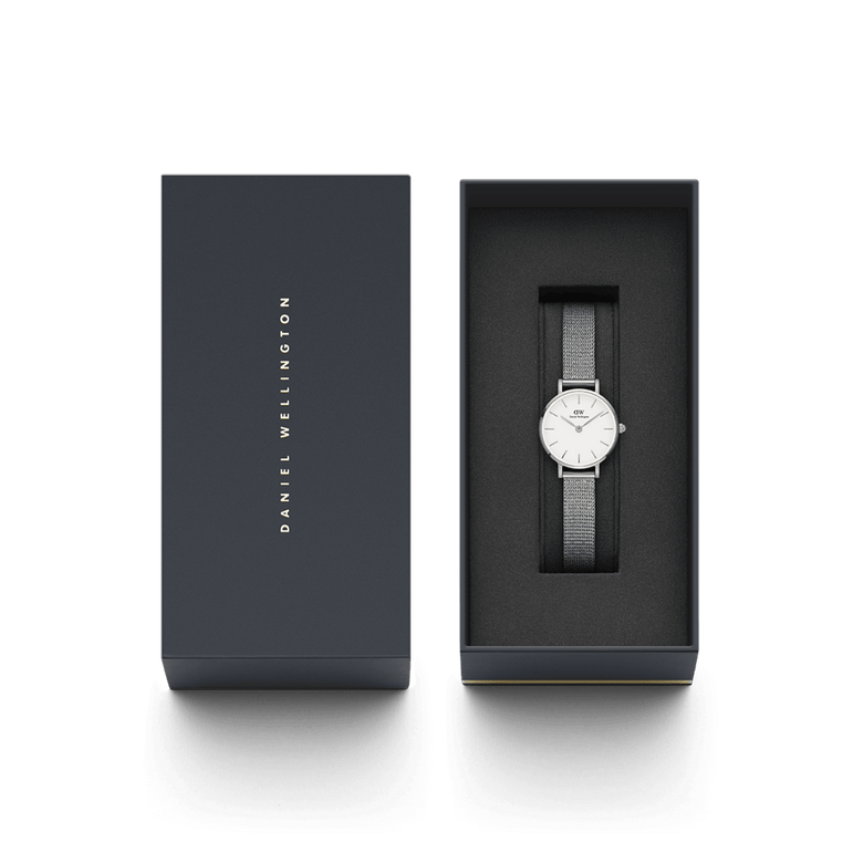 Petite Pressed Sterling ladies watch with a silver mesh strap and white dial, elegantly presented in a branded Daniel Wellington gift box, perfect for gifting or adding to your collection.