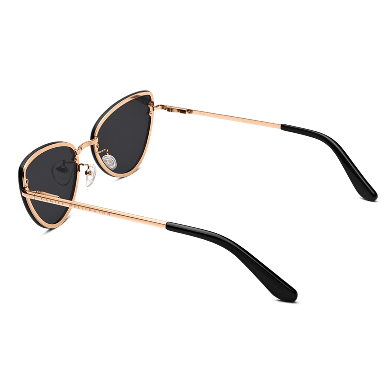 Lynx Steel Black sunglasses with a rose gold plated stainless steel frame, modern cat eye shape, black nylon lenses, and comfortable black temple tips, shown from a rear angle.