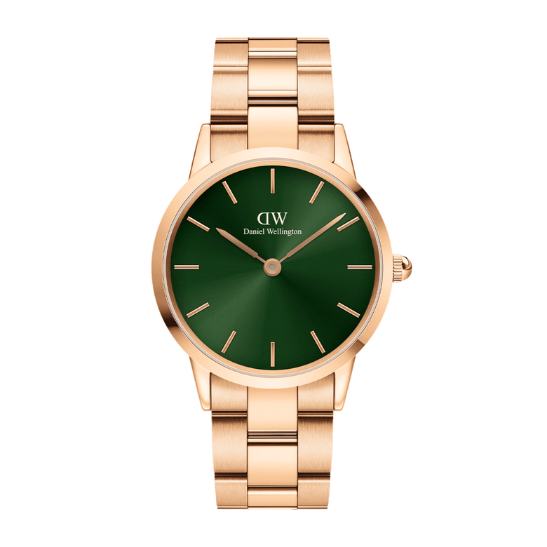 Rose gold ladies watch with a polished stainless steel bracelet and a striking emerald green dial, featuring minimalist hour markers and a classic round face.