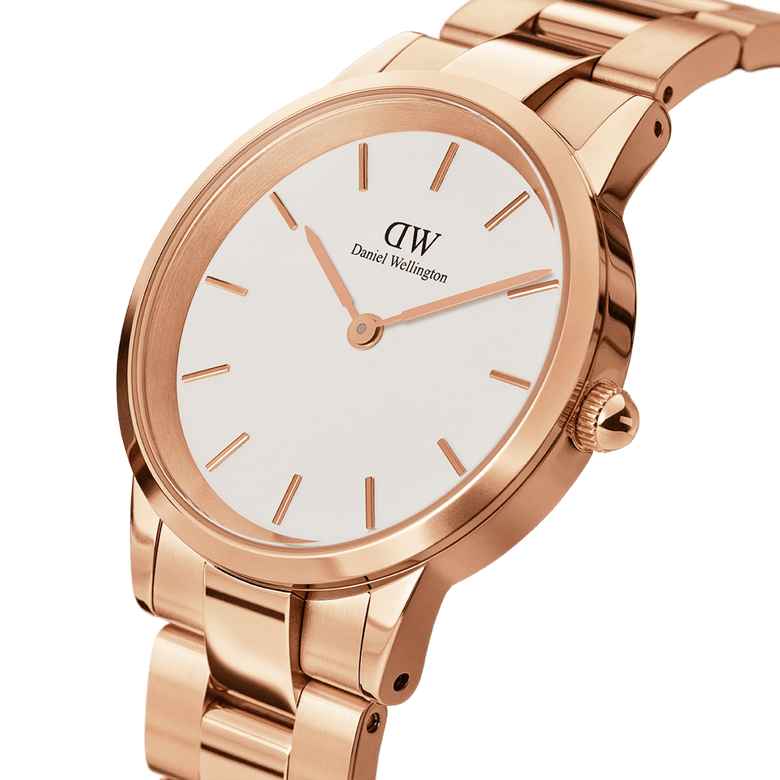 Close-up of the Iconic Link Rose Gold watch showing its polished rose gold stainless steel case, minimalist eggshell white dial, and sculpted three-link bracelet, highlighting its refined and modern design.