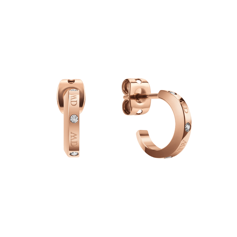 Classic Lumine Rose Gold earrings featuring a petite hoop design, polished rose gold finish, engraved logotype, and four sparkling crystal accents, shown with secure stud closures.