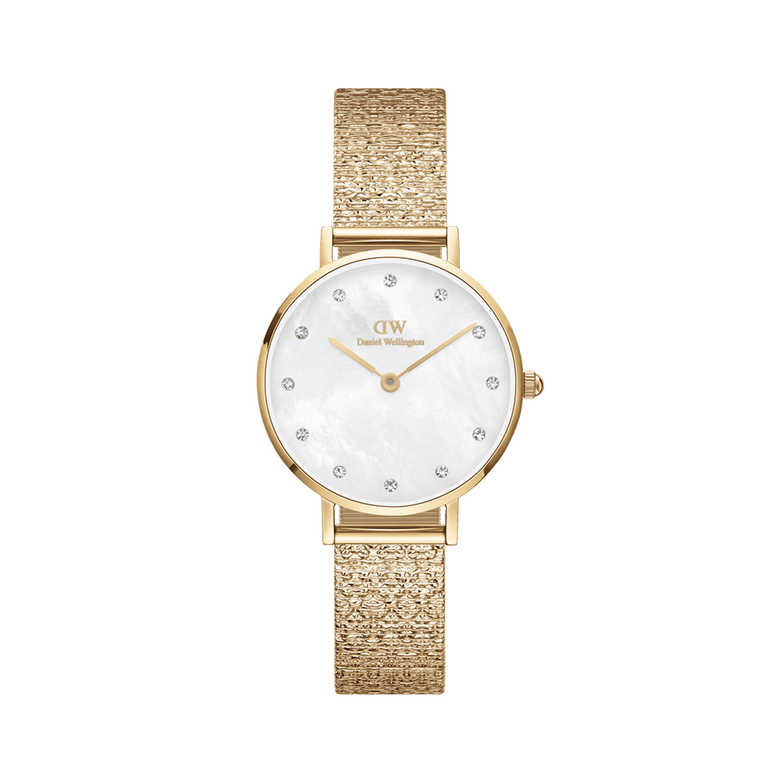 Petite Lumine Pressed Piano White MoP Gold watch with a gold pressed Studio Strap, white mother of pearl dial, and crystal hour markers, featuring a slim 28mm case and elegant styling suitable for everyday wear.