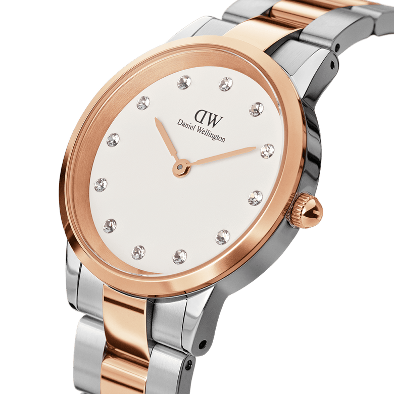 Close-up of the Iconic Link Lumine Rose Gold ladies watch, showcasing its polished rose gold and silver stainless steel bracelet, eggshell white dial, and crystal hour markers for a refined and elegant look.