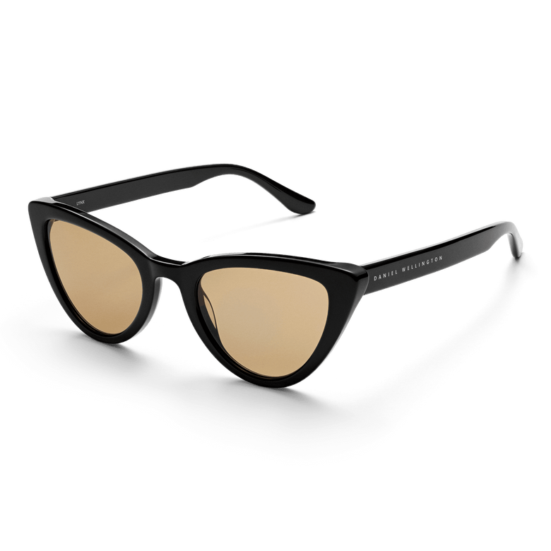 Lynx Bio-Acetate Black/Yellow sunglasses featuring a bold black cat eye frame, yellow nylon lenses, and subtle branding on the arms, designed for stylish UV400 protection and everyday comfort.