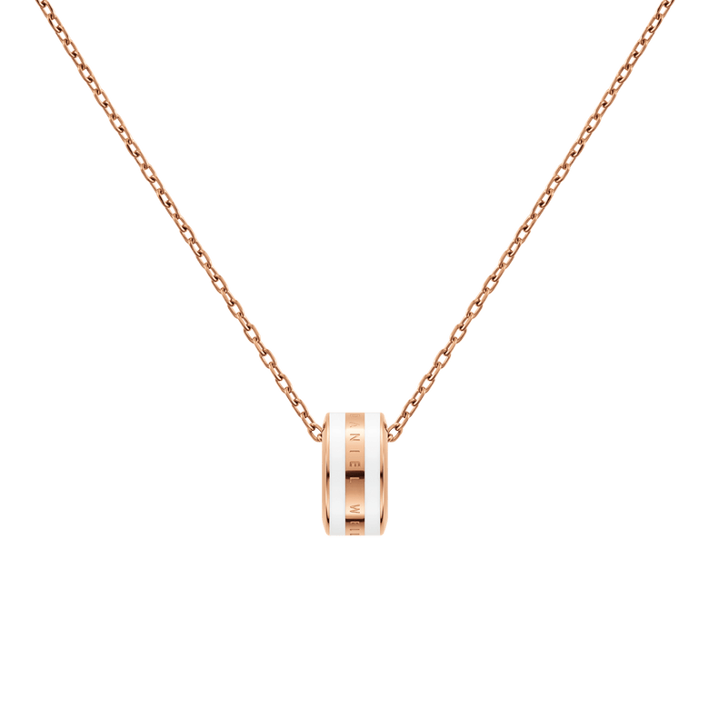 Rose gold chain necklace with a circular satin white enamel pendant, featuring a minimalist design and fine detailing, ideal for layering or wearing as a subtle statement piece.