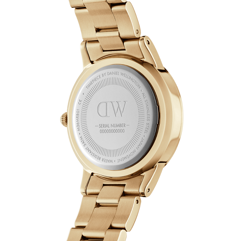 Back view of the Daniel Wellington Iconic Link Unitone G gold watch, showing the stainless steel case back, engraved branding, and polished gold link bracelet.