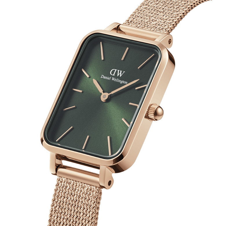 Quadro Pressed Melrose Emerald ladies watch with a rectangular emerald green dial, rose gold mesh strap, and minimalist gold hour markers, shown in a close-up angle highlighting its refined finish.