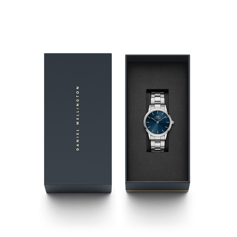 Daniel Wellington Iconic Link Arctic Silver watch with a blue dial and stainless steel bracelet, presented in an elegant branded gift box.