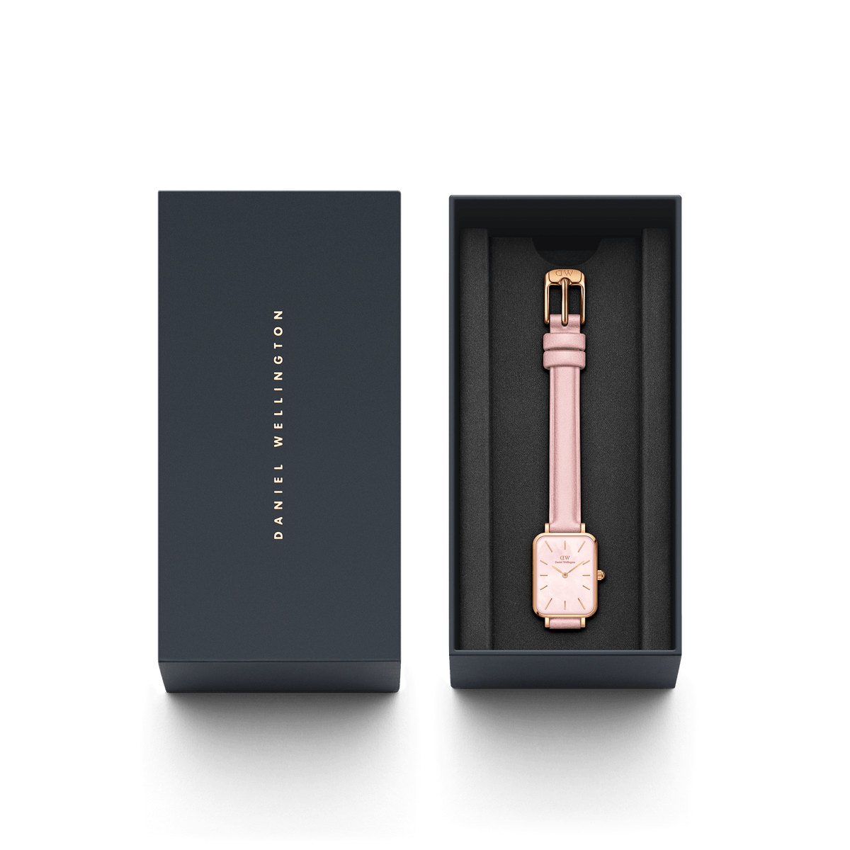 Quadro Cherry Blossom ladies watch with a pastel pink leather strap and rose gold rectangular case, presented in a branded Daniel Wellington gift box.