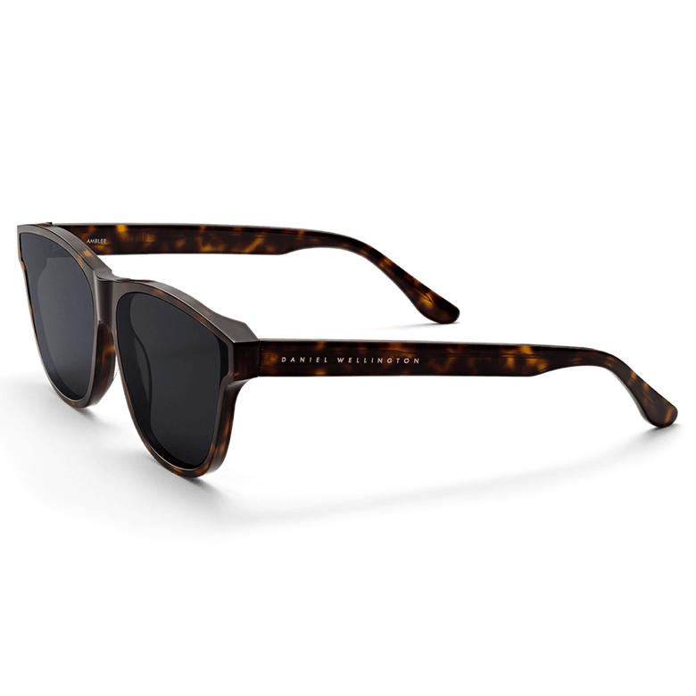 Ambler Bio-Acetate Dark Havana sunglasses featuring a rectangular tortoiseshell frame, dark UV400 lenses, and the Daniel Wellington logo on the arm, designed for women seeking both style and sun protection.