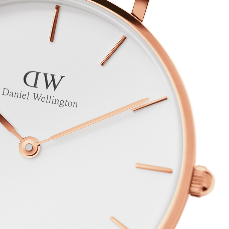 Detail view of the Petite St Mawes women’s watch, showing the rose gold-plated case, slim hands, and minimalist white dial with subtle hour markers.