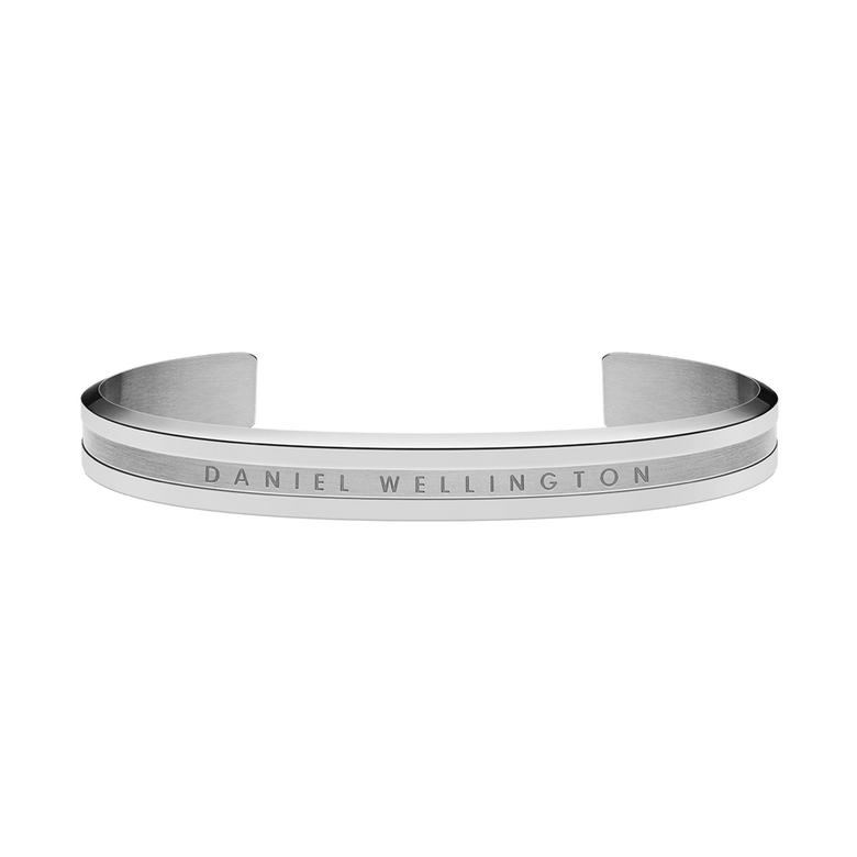 Classic Elan Bracelet Silver in stainless steel with a brushed and polished finish, featuring a subtle Daniel Wellington logo engraved on the front and a slim, open cuff design.