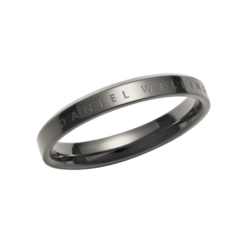 Classic Ring Graphite in a modern graphite finish, featuring a slim stainless steel band with engraved Daniel Wellington branding, highlighting its minimalist and elegant design.