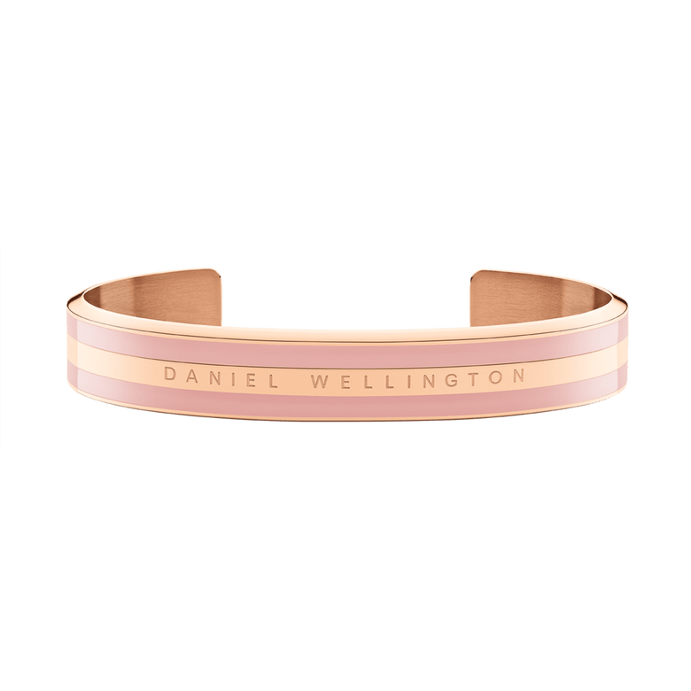 Emalie Bracelet Dusty Rose Rose Gold showcases a wide cuff in soft pink enamel paired with rose gold stainless steel, featuring the Daniel Wellington logo for a modern, minimalist jewellery look.