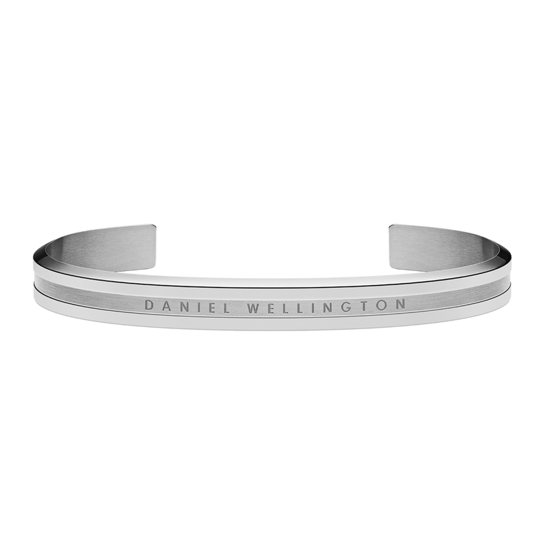 Polished Elan Bracelet Silver with a minimalist open cuff design, crafted from stainless steel and featuring the Daniel Wellington logo engraved on a brushed band.