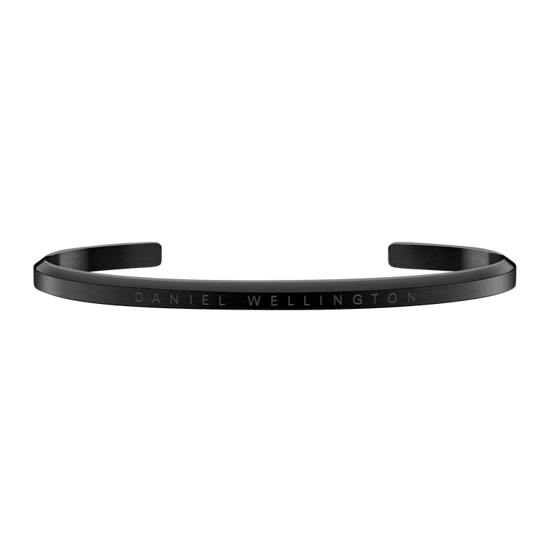 Classic Bracelet in matte black stainless steel with engraved Daniel Wellington branding, featuring a slim open cuff design suitable for men and women.