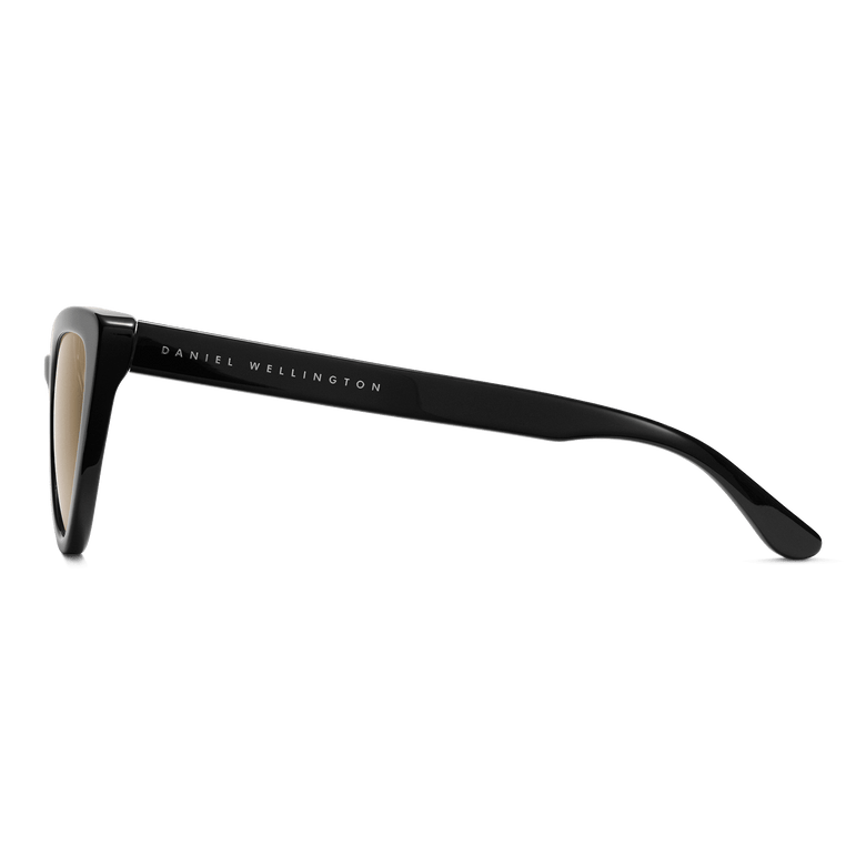 Lynx Bio-Acetate Black/Yellow sunglasses with a glossy black cat eye frame, yellow nylon lenses, and Daniel Wellington branding on the arm, highlighting the designer finish and sustainable materials.